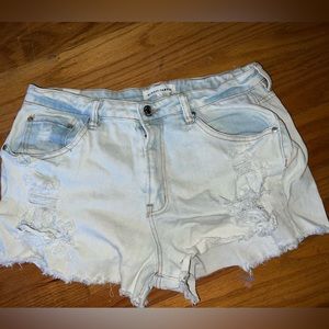 Almost famous size 11 light wash denim distressed shorts.